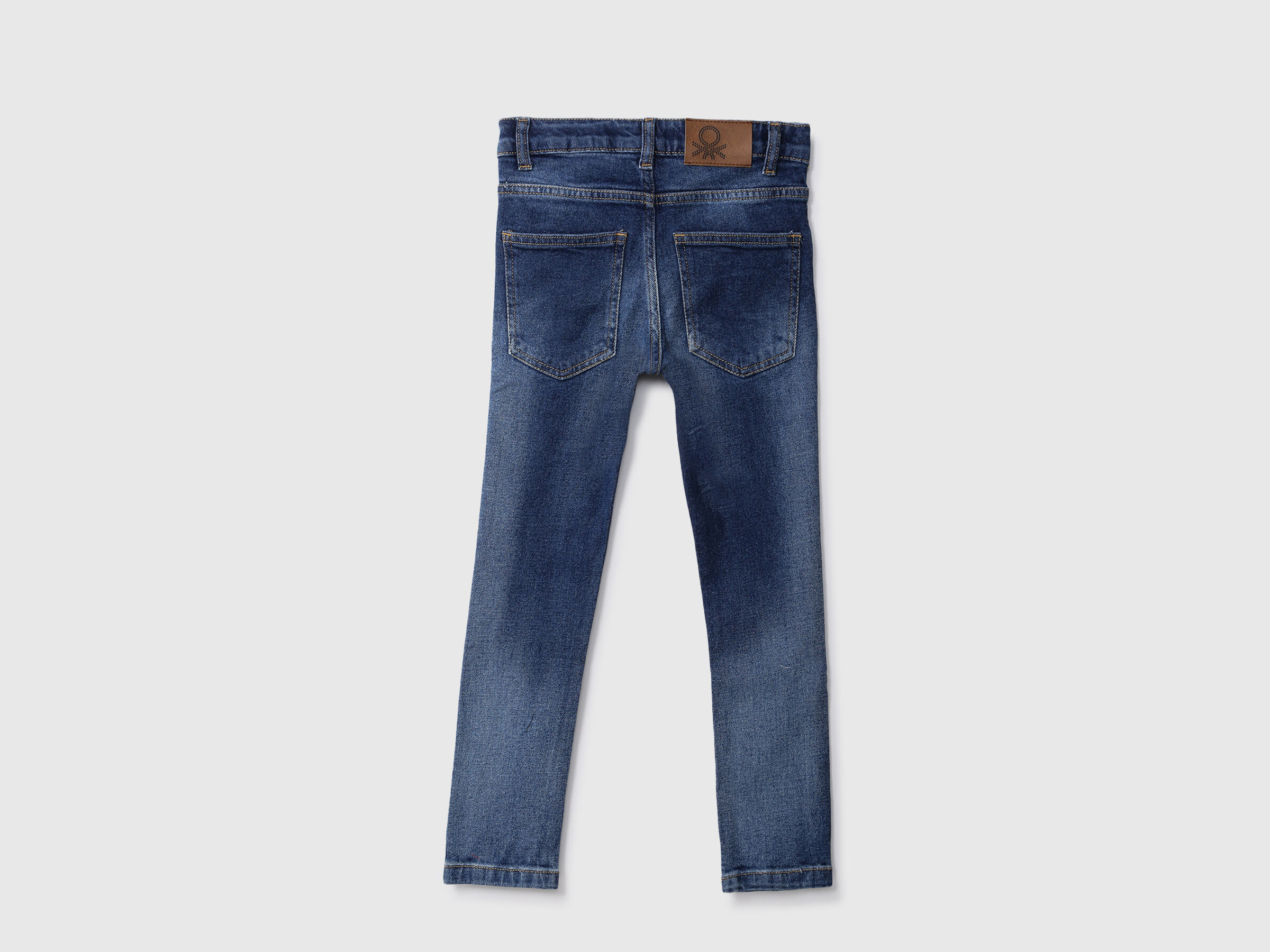 SKINNY DENIM WITH BRANDING AT WAIST image number 1