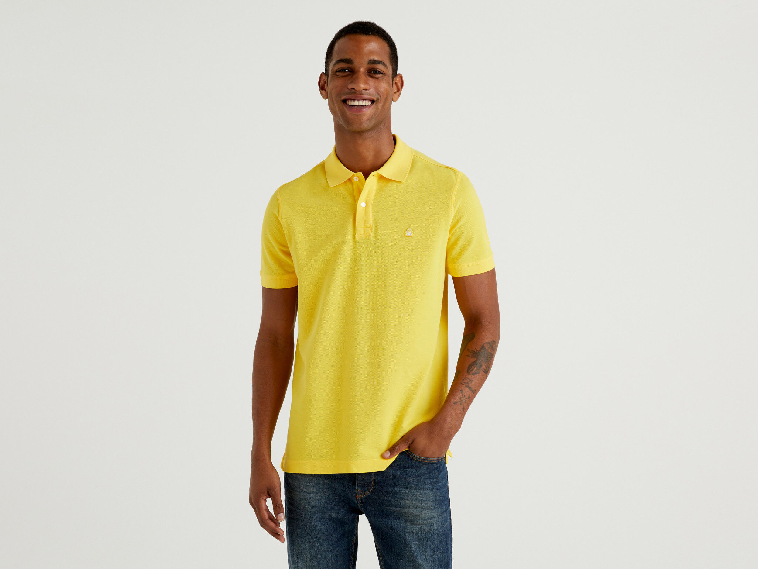 yellow short sleeve polo shirt