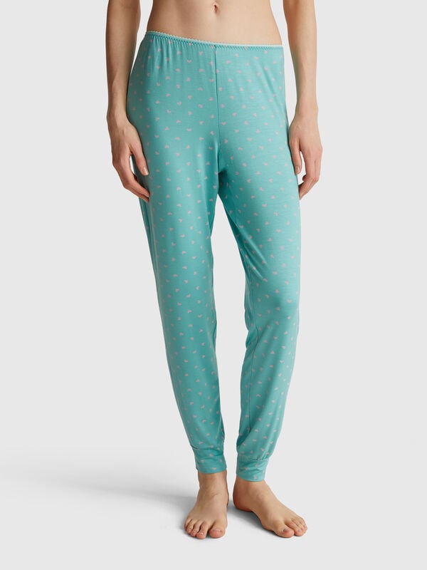 Light blue trousers with heart print Women