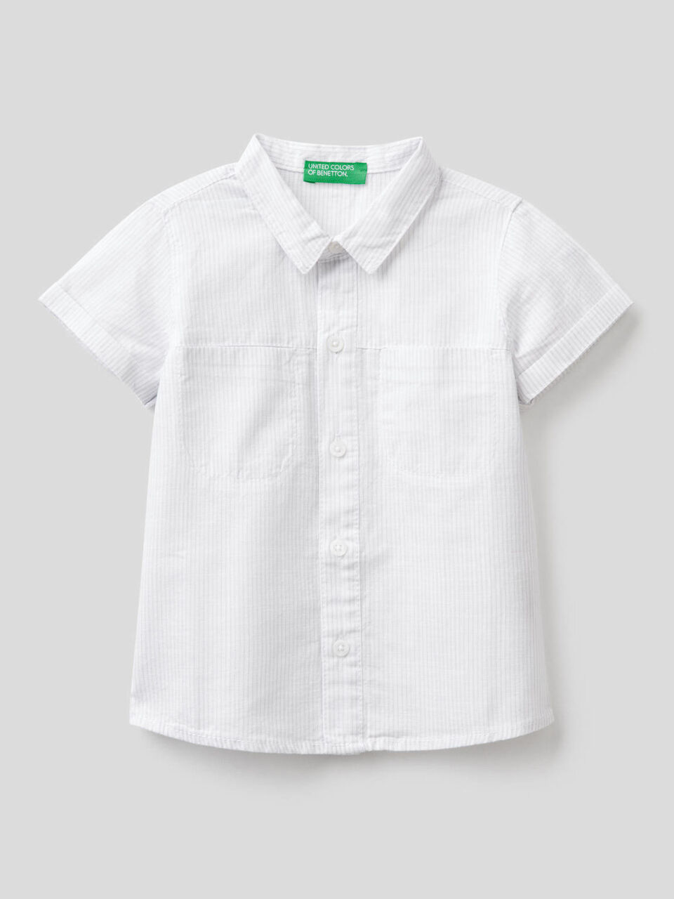 Short sleeve shirt with thin stripes image number 1