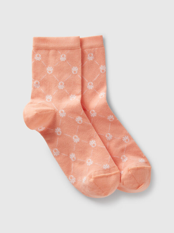 Pink socks with logos