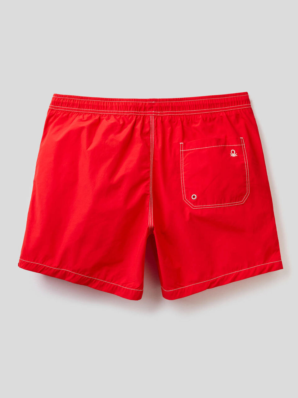 Swim trunks with clashing details image number 2
