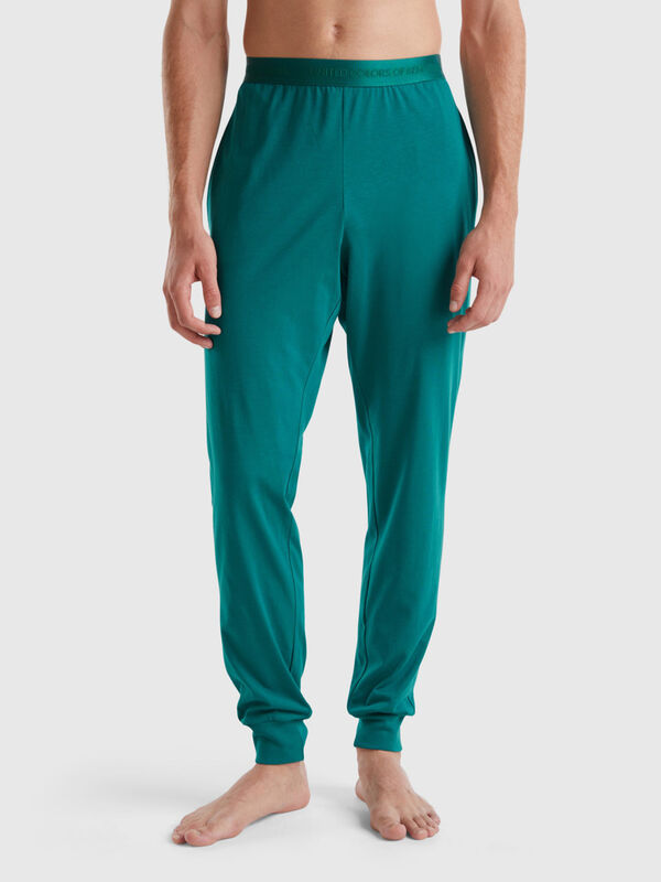 Trousers with elastic logo Men