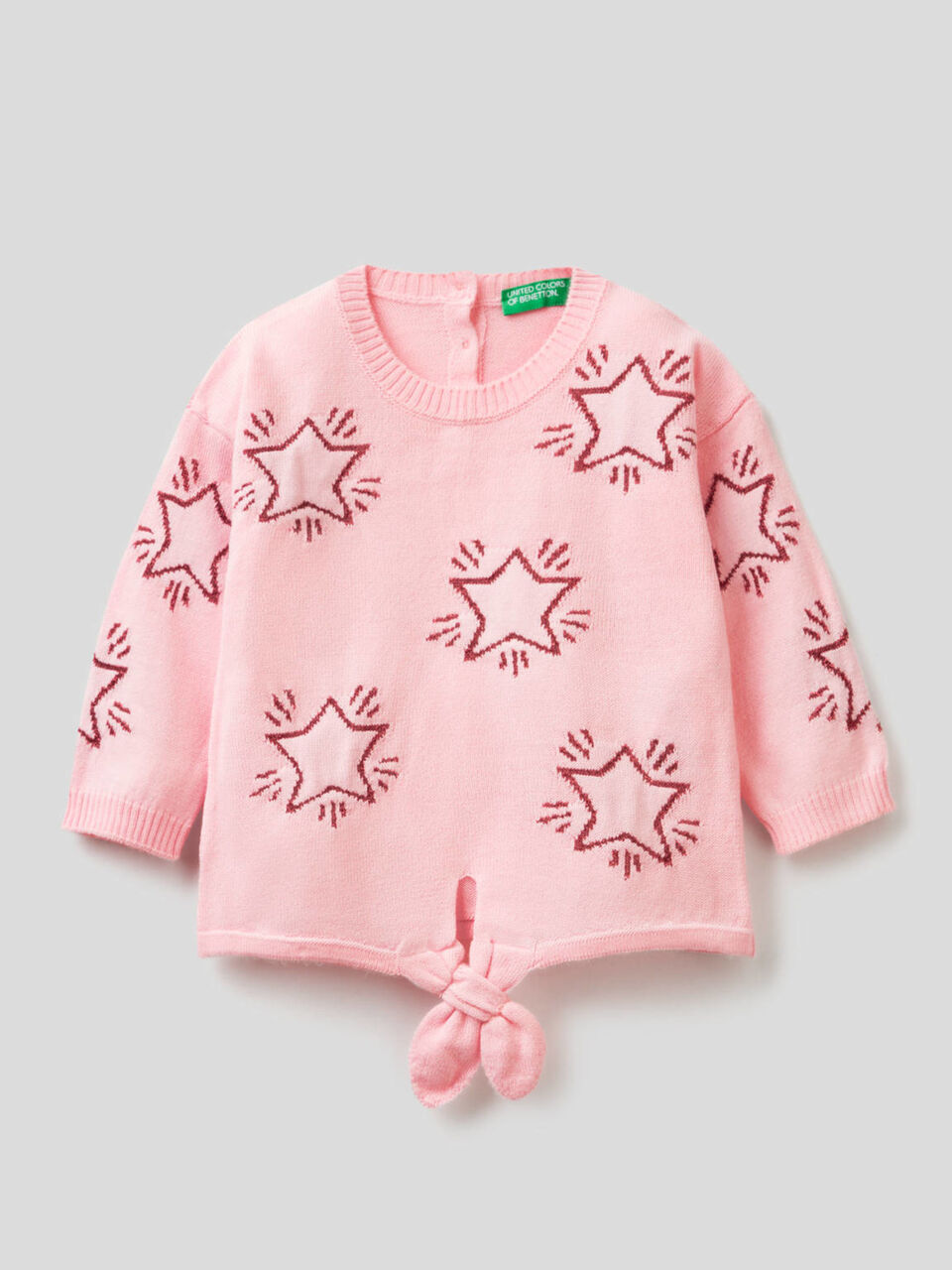 Sweater with inlaid stars and bow image number 1