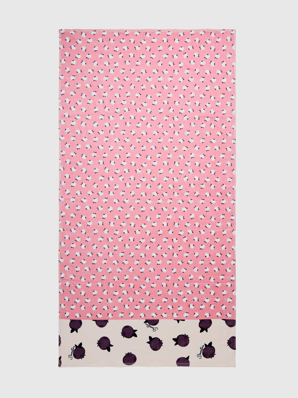 Pink beach towel with blueberry print