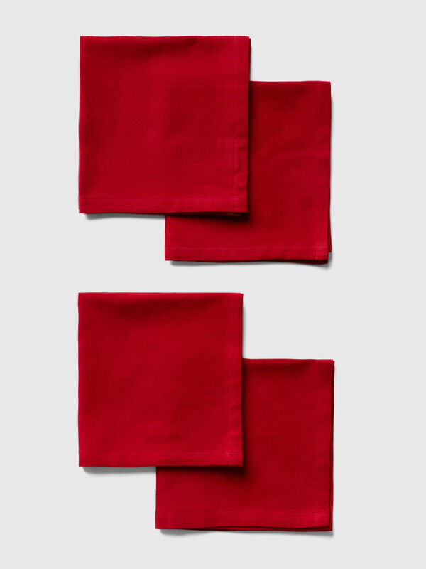 Four red napkins