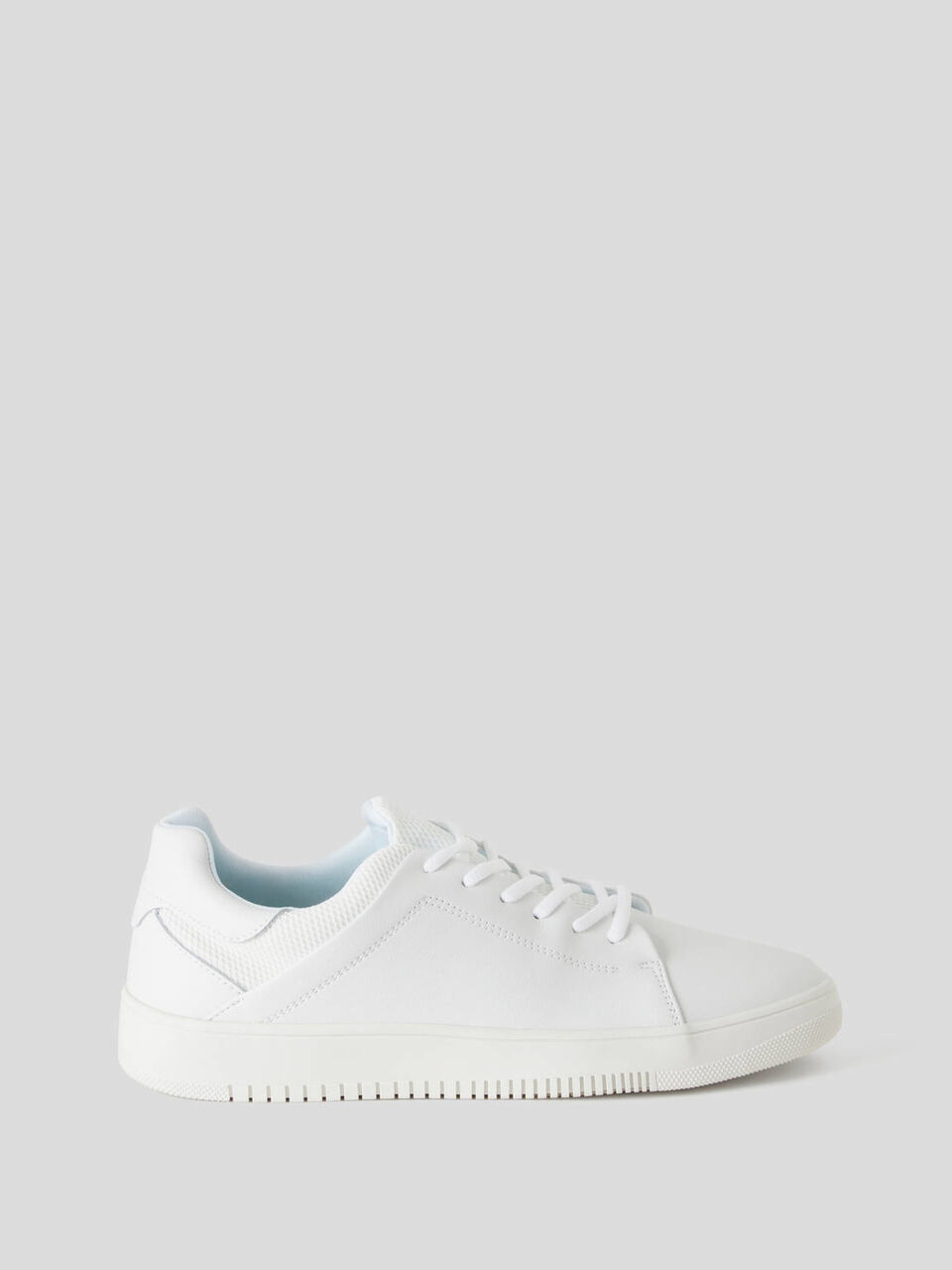 Sneakers in leather with fabric details image number 1