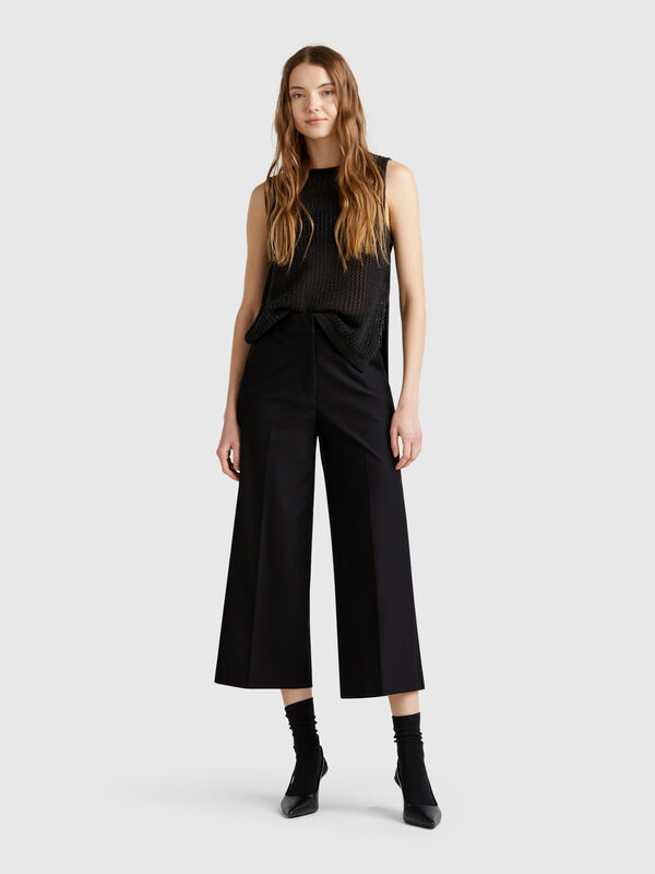 Cropped high-waisted trousers Women