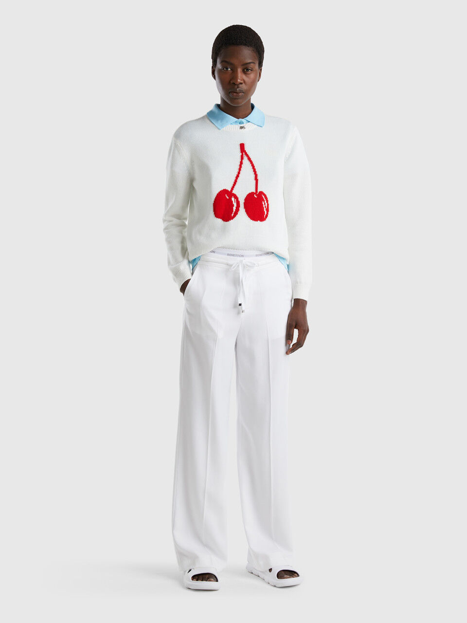 White sweater with cherry inlay